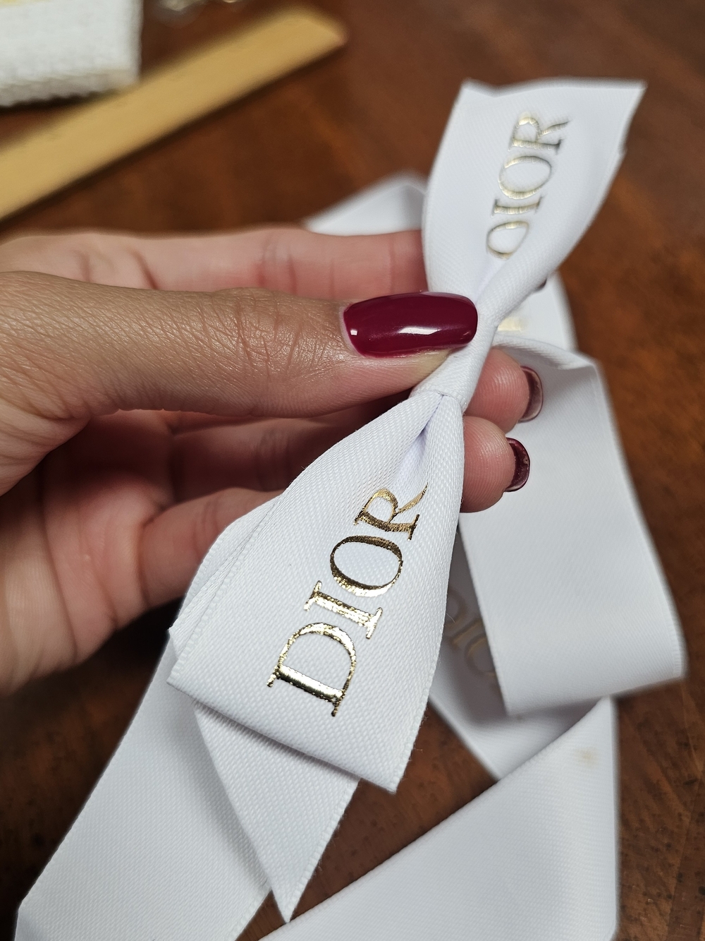 Dior White Ribbon Bow with Gold Logo